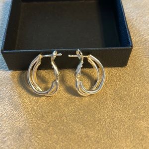 Silver tone hoop earrings